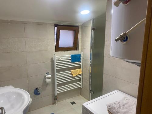 Koupelna v ubytování Apartment Poturmahala
