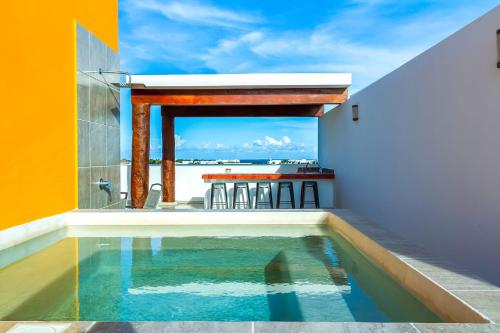 Hacienda Style Apt with Oceanview Roof Pool & Cenote!