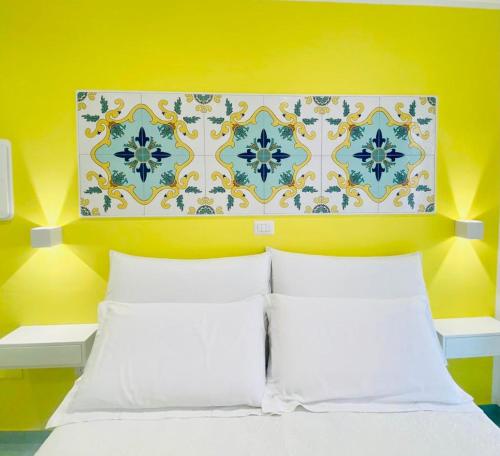 Un pat sau paturi într-o cameră la Cilento Experience rooms
