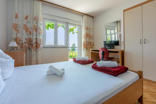 Ένα ή περισσότερα κρεβάτια σε δωμάτιο στο Apartments BRANA