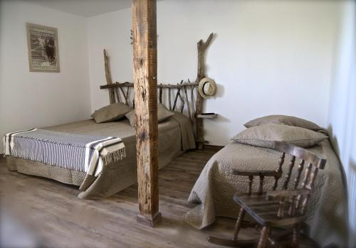 Katil atau katil-katil dalam bilik di Mas du Menage en Camargue Manade Clauzel