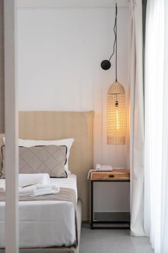Katil atau katil-katil dalam bilik di Mirablue Luxury Residences