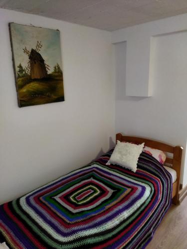 Ένα ή περισσότερα κρεβάτια σε δωμάτιο στο Rustykalny Apartament