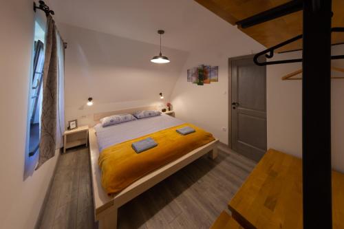 A bed or beds in a room at Timber valley