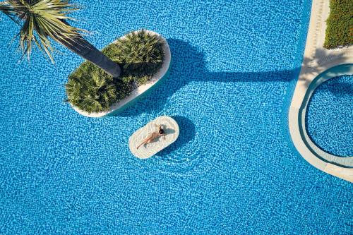 an overhead view of a pool with a pair of scissors at Lesante Classic - Preferred Hotels & Resorts in Tsilivi