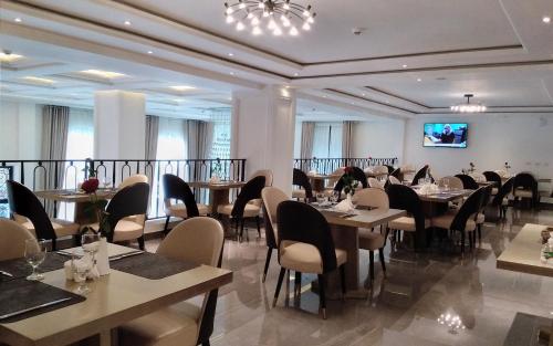 A restaurant or other place to eat at Check Inn Hotel Addis Ababa