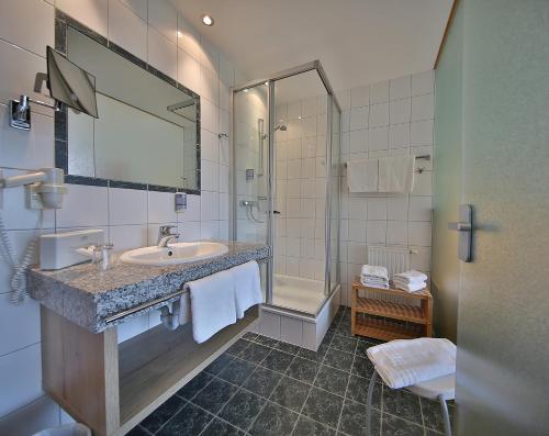 Koupelna v ubytování Hotel Pension Geiger