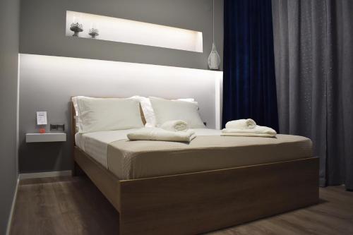 Cama o camas de una habitación en Raffinato Suite (Cielo suites)