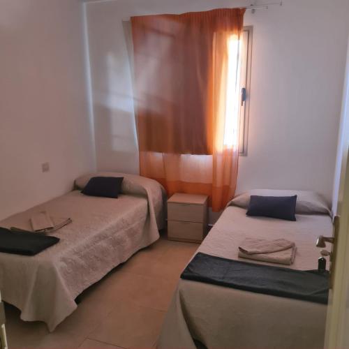 Nice rooms in a shared apartment in the centre of Corralejo Habitaciones en piso compartido