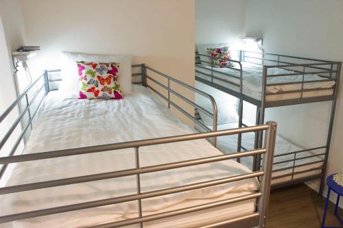 A bunk bed or bunk beds in a room at Warsaw Downtown Hostel