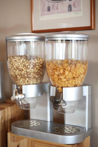 a food processor filled with nuts on top of a stove at Hotel Murter in Murter