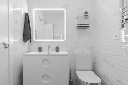 A bathroom at Apartment with pool TORREVISTA ROCIO