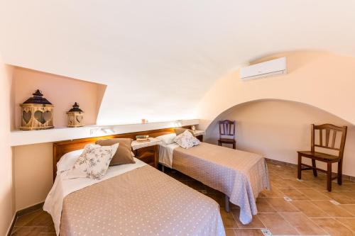 Posteľ alebo postele v izbe v ubytovaní CASA BELLAVISTA Scala Minuta Amalfi Coast