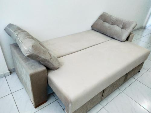 Кровать или кровати в номере Apartamento aconchegante no Jardim Paulistano