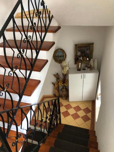 a staircase in a home with wooden floors at Villa Stefanija in Ohrid