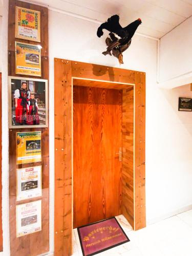 a wooden door with a skateboard on top of it at Partenerhof in Partenen