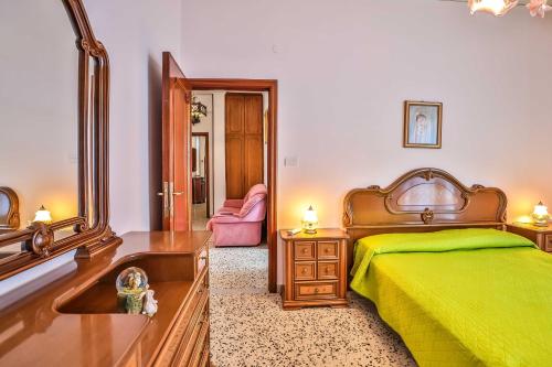 A bed or beds in a room at Apartment with 4 bedrooms in Amalfi