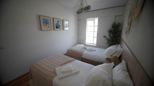Letto o letti in una camera di Sea Soul Esposende