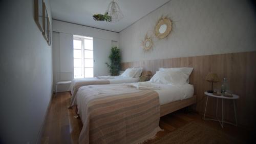 Letto o letti in una camera di Sea Soul Esposende