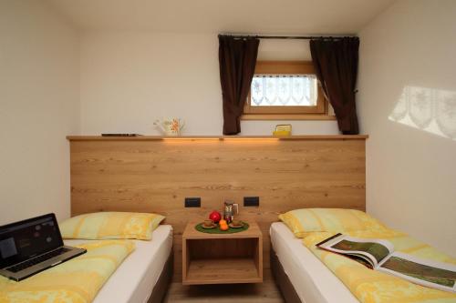 En eller flere senge i et værelse på Danubio - Happy Rentals
