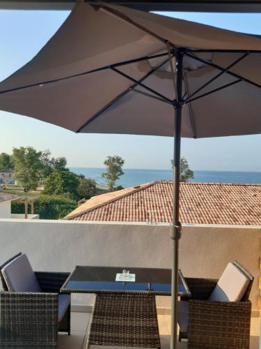 Studio les pieds dans l'eau vue sur mer