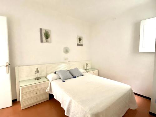 Postel nebo postele na pokoji v ubytování Llafranc
