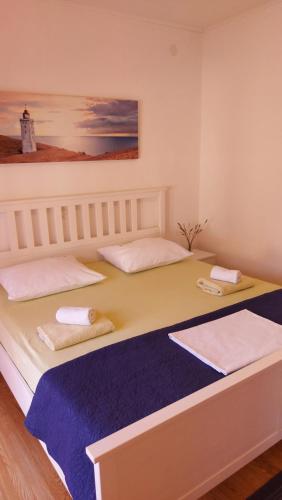 Posteľ alebo postele v izbe v ubytovaní Apartments Valiza III Large apartment - 3 bedrooms and parking space i Apartments Valiza IV