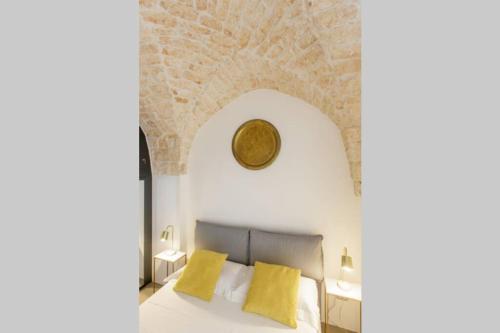A bed or beds in a room at TORRE BIANCA VISTA MARE