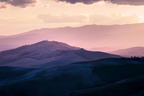 a view of a mountain at sunset at Podere Orto Wine Country House in Trevinano
