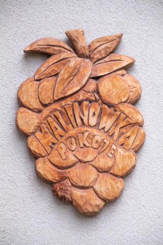 a brown cookie with the words swingingoria on it at Pokoje Gościnne Malinówka in Krościenko
