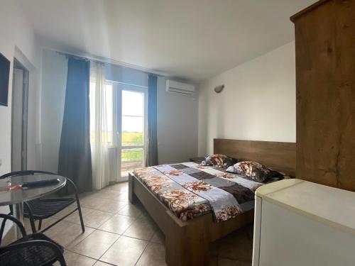 Postel nebo postele na pokoji v ubytování Vila Sofia