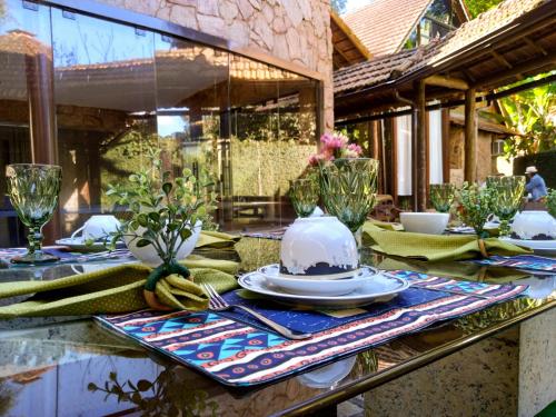 Um restaurante ou outro lugar para comer em Pousada Águas da Serra