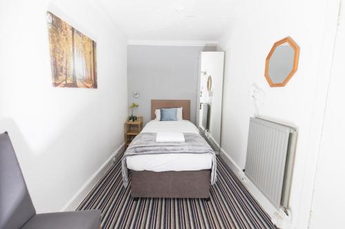 Postel nebo postele na pokoji v ubytování Edinburgh Rays Guest House