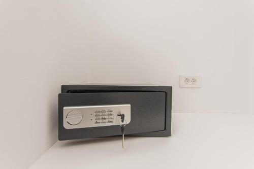 a electrical outlet with a cord plugged into it at Bianco a Nero Mykonos in Mýkonos City