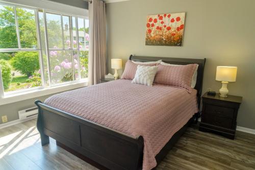 Ένα ή περισσότερα κρεβάτια σε δωμάτιο στο Harbourview Inn