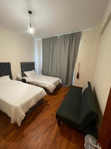 Кровать или кровати в номере B city view