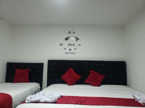 Кровать или кровати в номере AW Hotel American Travel