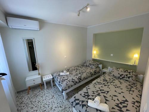 Postel nebo postele na pokoji v ubytování Vatos 2 bedroom apartment
