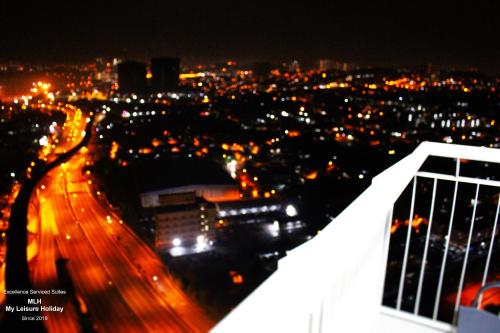 a view of a city at night with lights at MLH Premier Suites @ Saville Cheras in Cheras