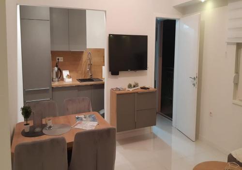 Η κουζίνα ή μικρή κουζίνα στο Ivana Apartment