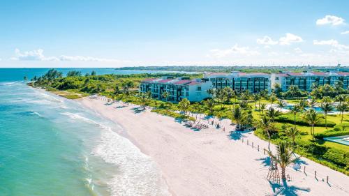 an aerial view of the beach at the resort at Mareazul Beach Front Condos At playa del Carmen in Playa del Carmen
