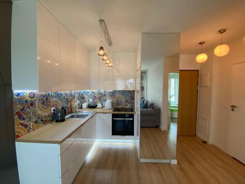 Kuchyňa alebo kuchynka v ubytovaní Apartament Swing