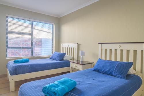 En eller flere senge i et værelse på No 73 Top Eersterivierstrand