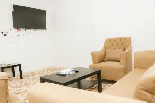 TV a/nebo společenská místnost v ubytování Diafat Alsaadah For Serviced Apartment-Dumat Al Jandal
