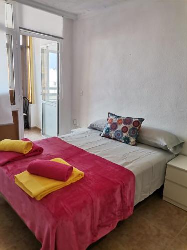 Postel nebo postele na pokoji v ubytování Apartament puerto