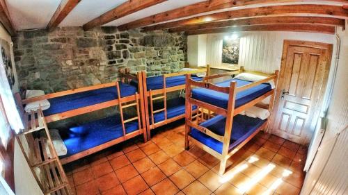 Двухъярусная кровать или двухъярусные кровати в номере Refugio Lucien Briet