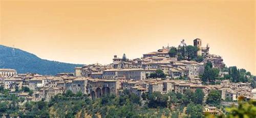 a town on top of a hill with houses at Charming House in Amelia with Lake View, 200 m² in Amelia