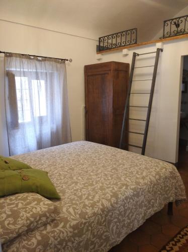 Postel nebo postele na pokoji v ubytování Agriturismo LE CASE ROTTE