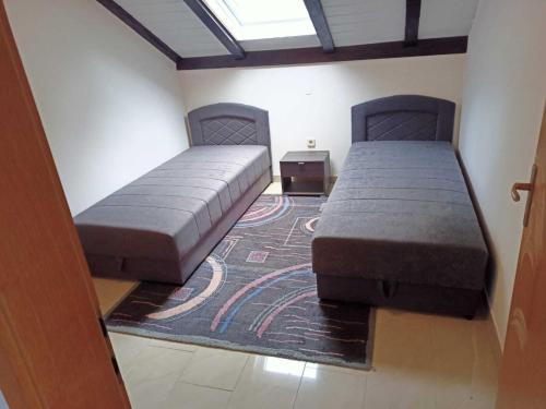Ένα ή περισσότερα κρεβάτια σε δωμάτιο στο Gizmo apartments