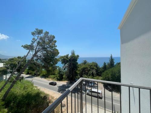 a balcony with a view of a road at Seaside Apartments Sword in Bar